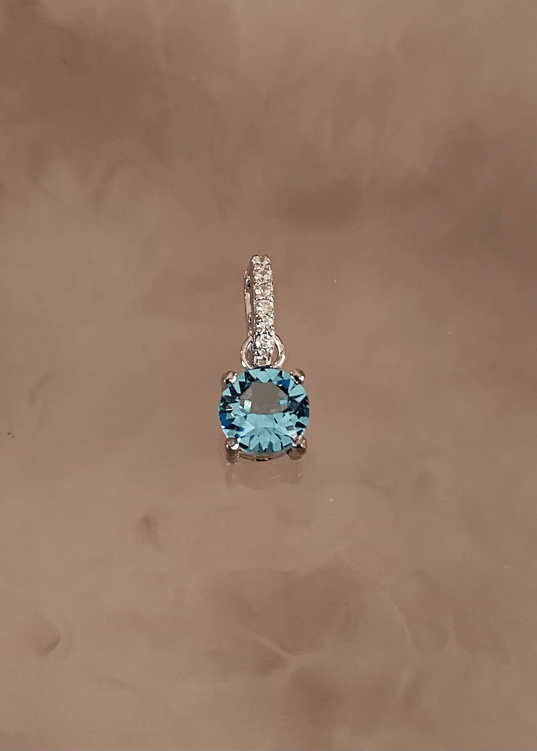 Dije en Plata 925 con cristal Swarovski color aguamarina y zirconia